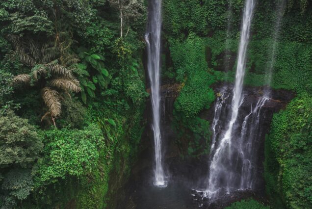 Aerial view of famous Sekumpul waterfalls in Bali, Indonesia. Tropical jungle rainforest