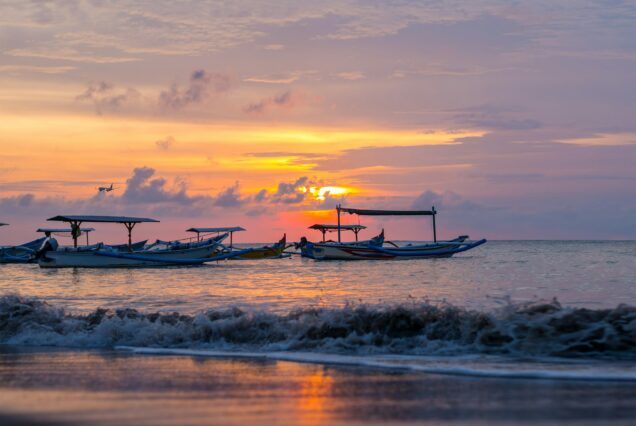 sunrise over fishing boats on Bali